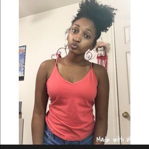 A salmon v neck tank top.